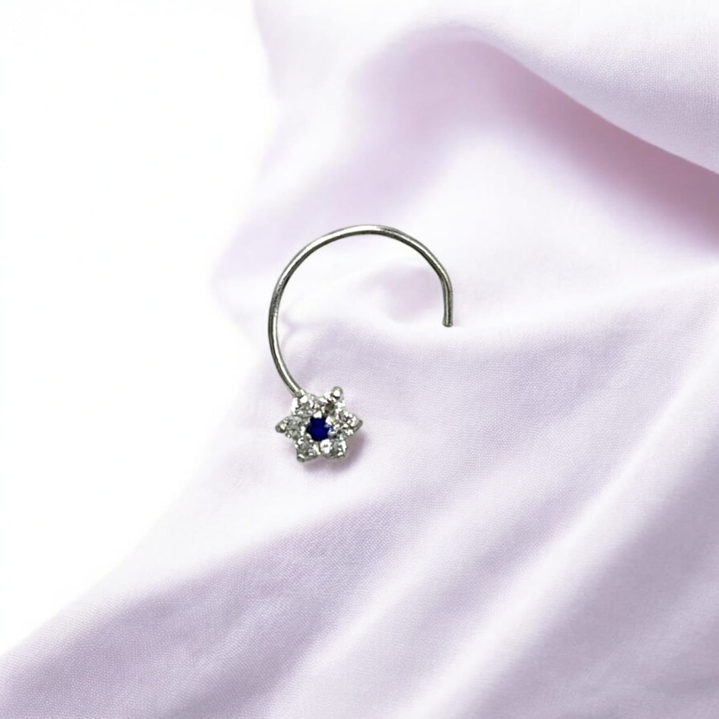 CZ Rhodium Plated Flower Shape With Blue Stone Nose Pin