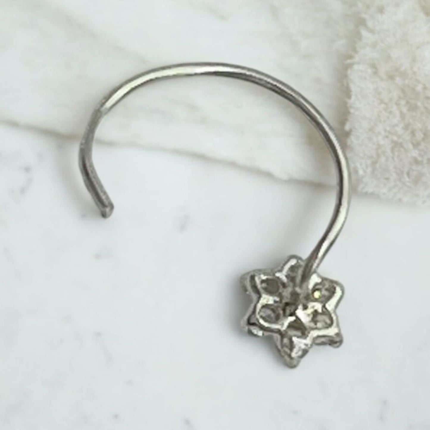 CZ Rhodium Plated Flower Shape With Blue Stone Nose Pin