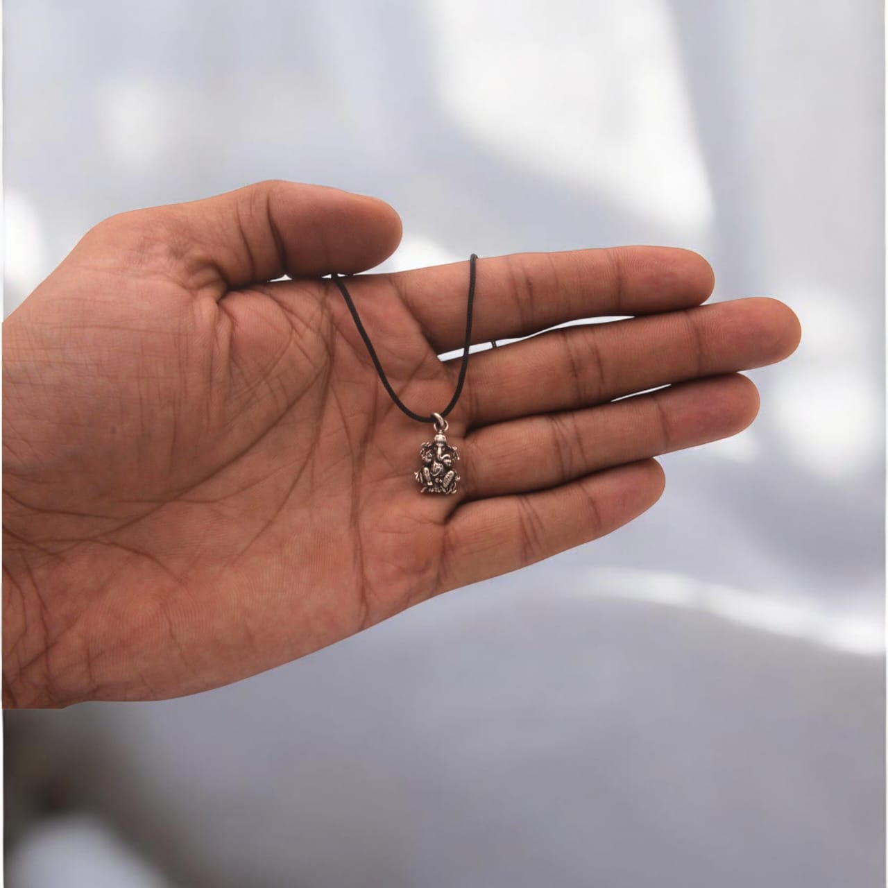 Silver Oxidised Ganesha Pendant With Black Thread