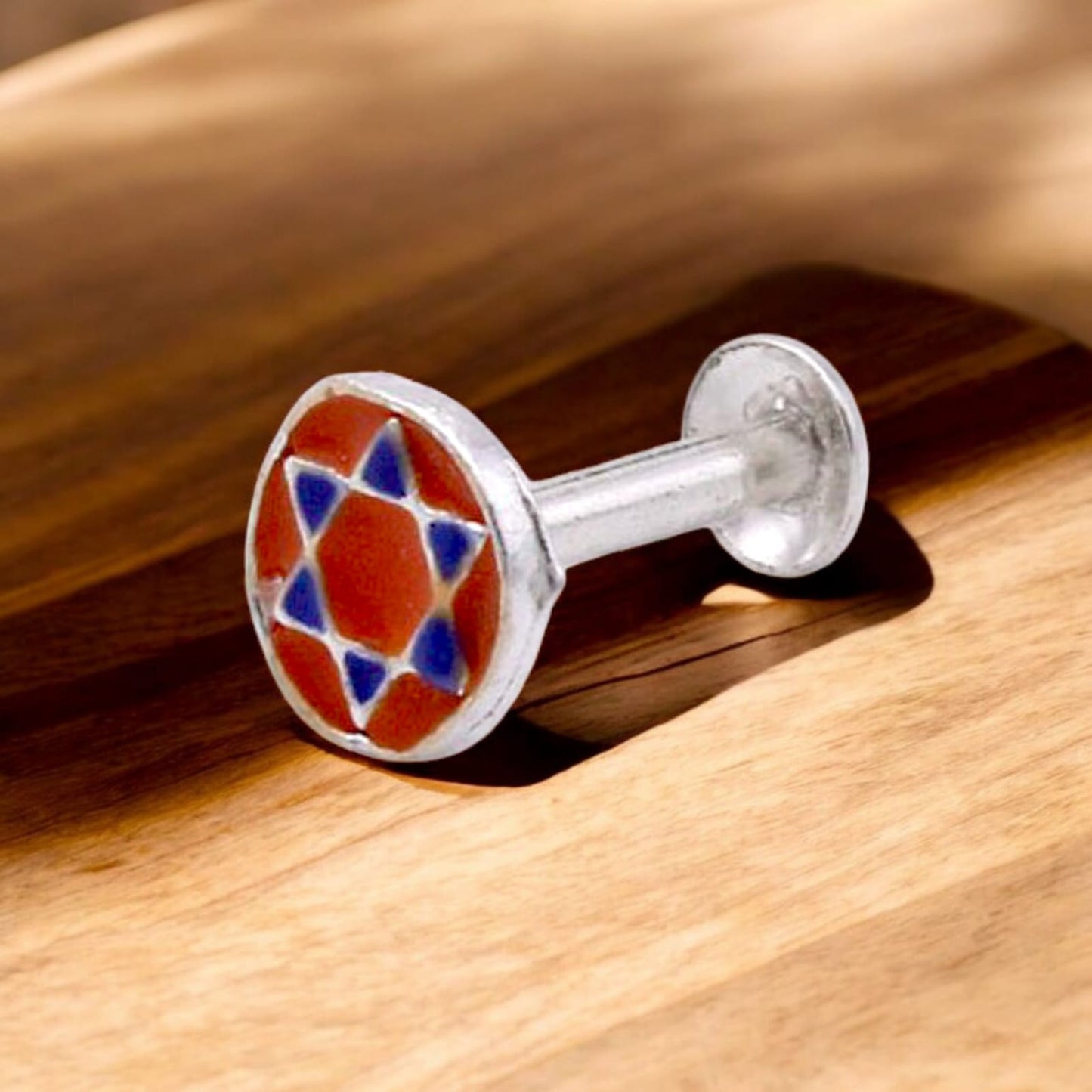 Orange and Blue Star In Circle Nose Pin